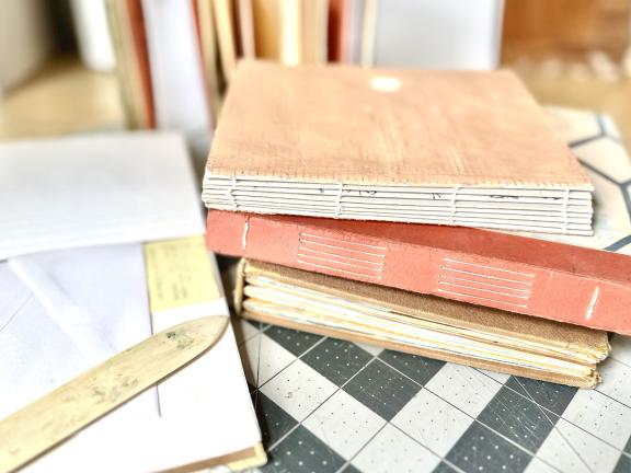 Handmade books displaying binding techniques