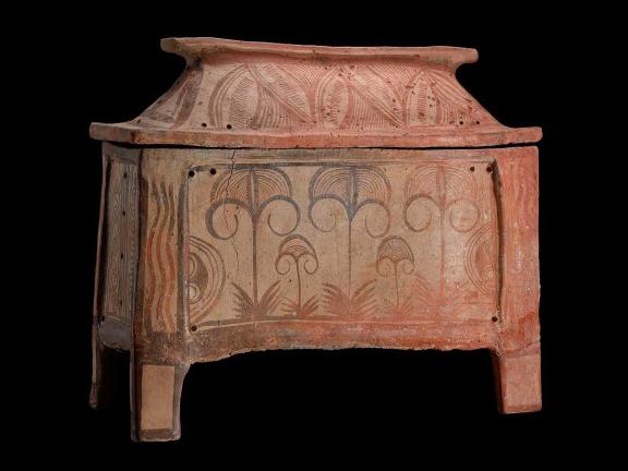 picture of a terracotta color coffin