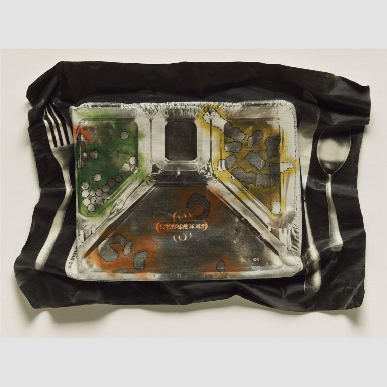 A crinkled canvas print of a tv dinner with a fork, spoon, and knife.