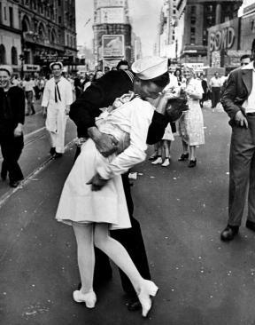 A U.S. Navy sailor kisses a dental assistant in Times Square, New York during V-J Day celebrations.