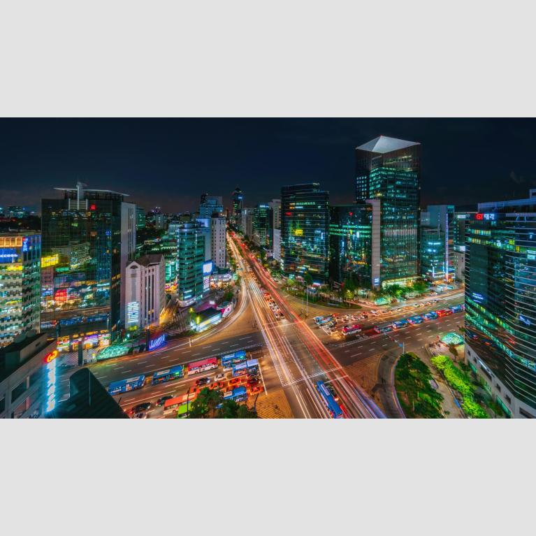 A bird's eye view panorama photo of Gangnam City at night.