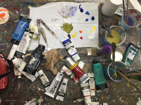 Top View of Watercolor Supplies, Paints and Brushes
