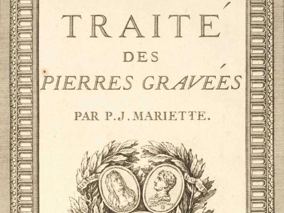 A detail of the cover page of an 18th-century book. 