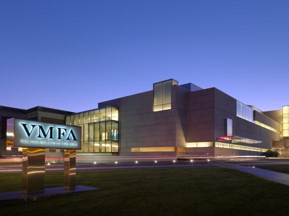 The façade of the Virginia Museum of Fine Arts at dusk.