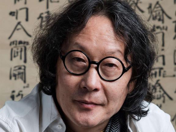 Headshot of artist Xu Bing